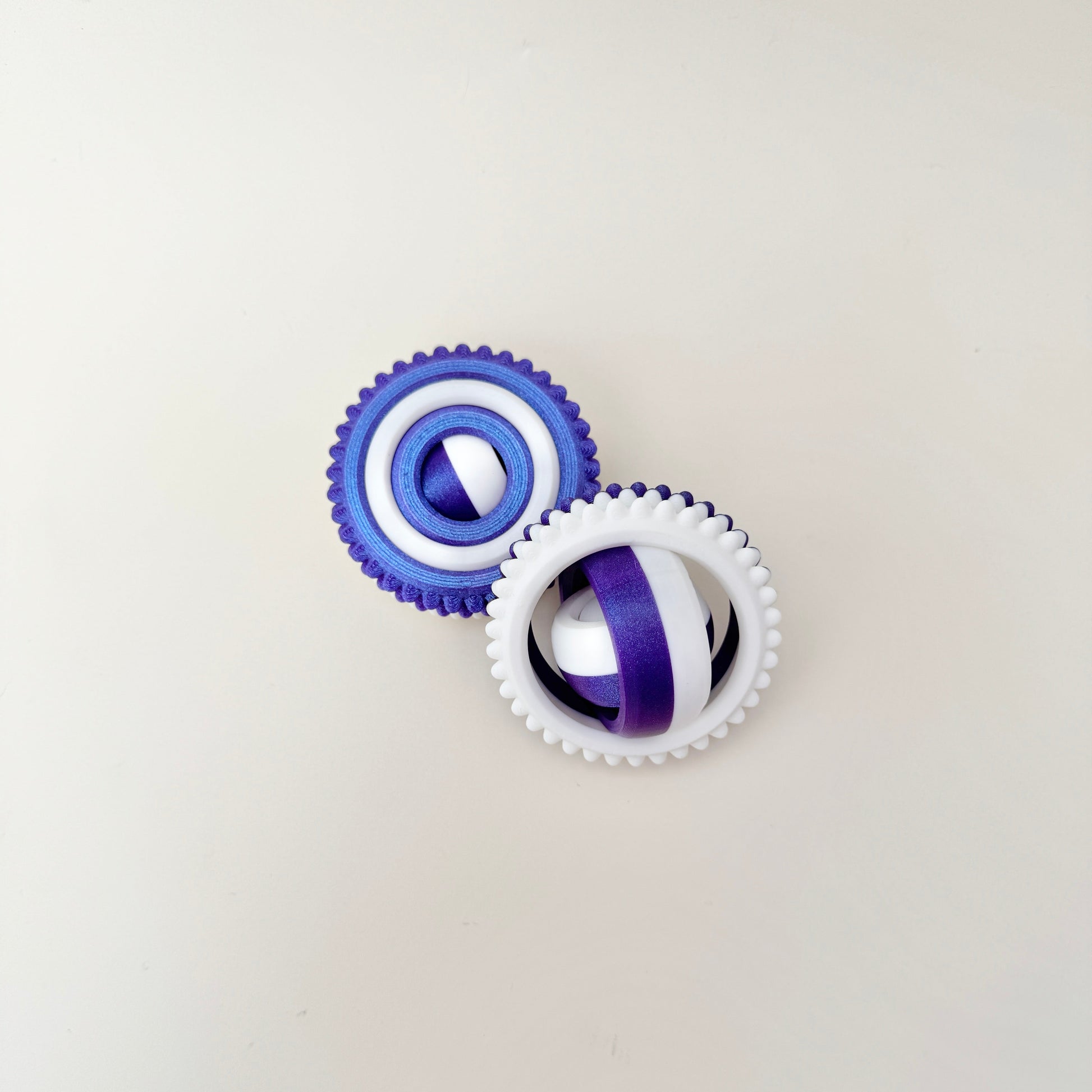 Bumpy-edge spinner for thumb tracing and movement.
