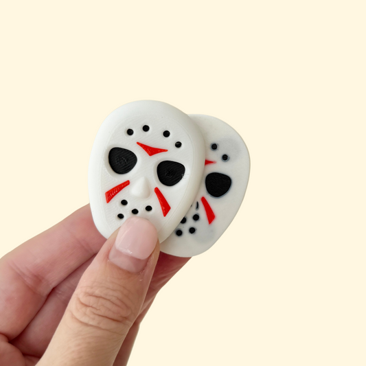 Handheld two-piece magnet fidget with low-noise snap and textured details for subtle stimming.
