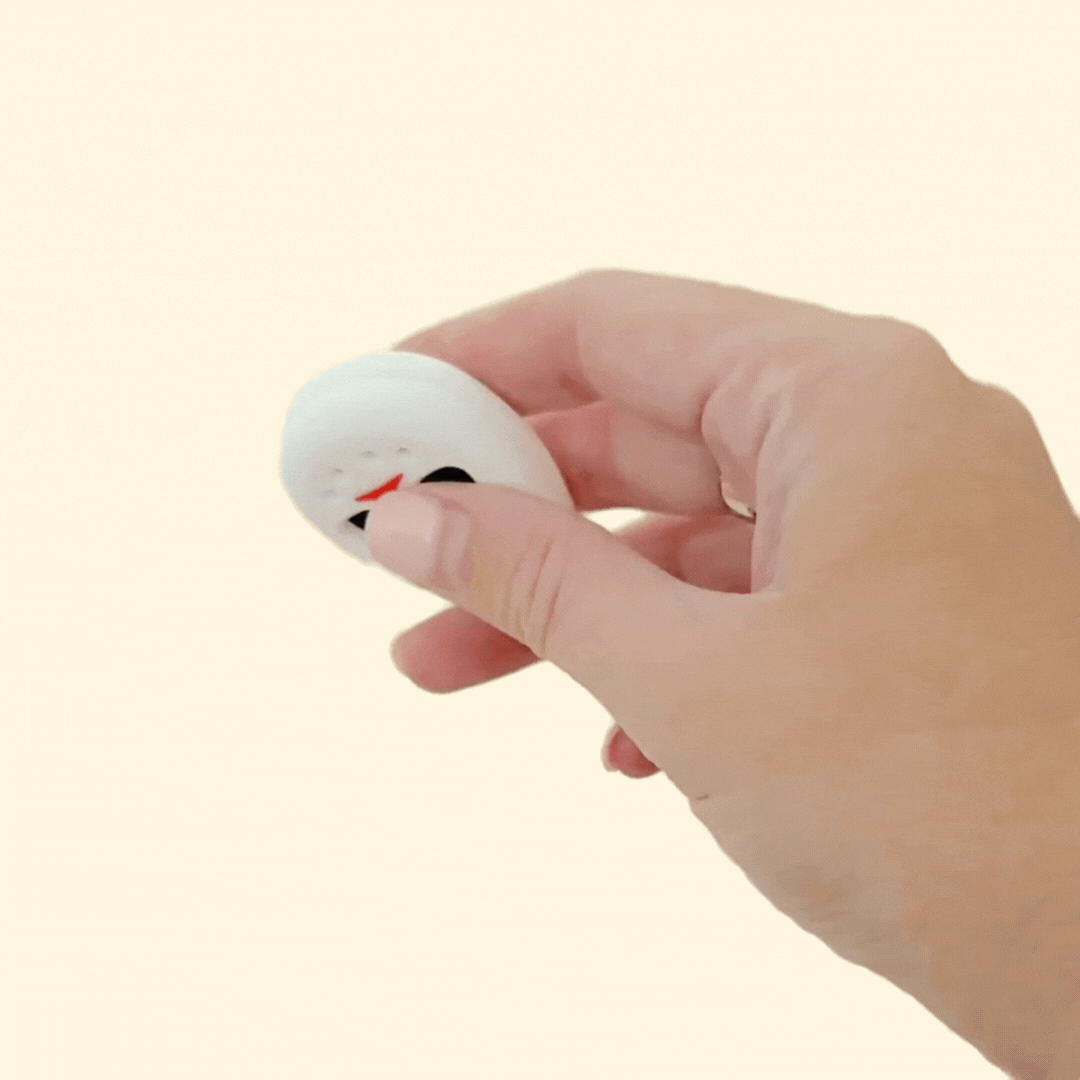 Pair of magnetic fidget halves that snap together and slide apart for grounding and focus.
