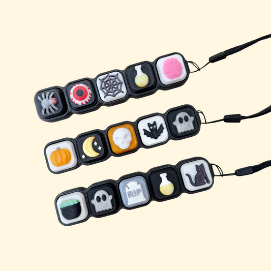 halloween themed texture clicker with five tactile buttons
