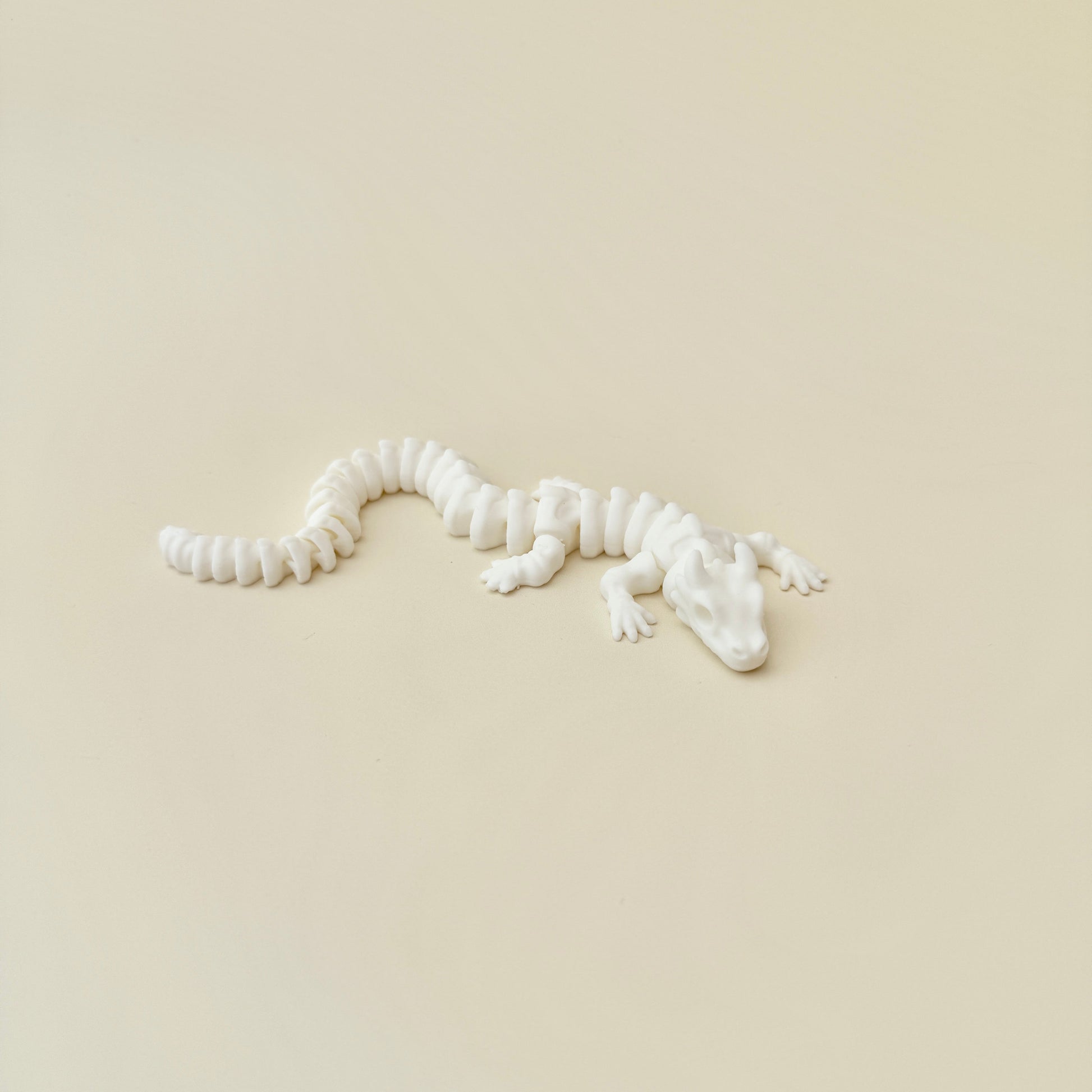 collectable articulated dragon with bone-like design
