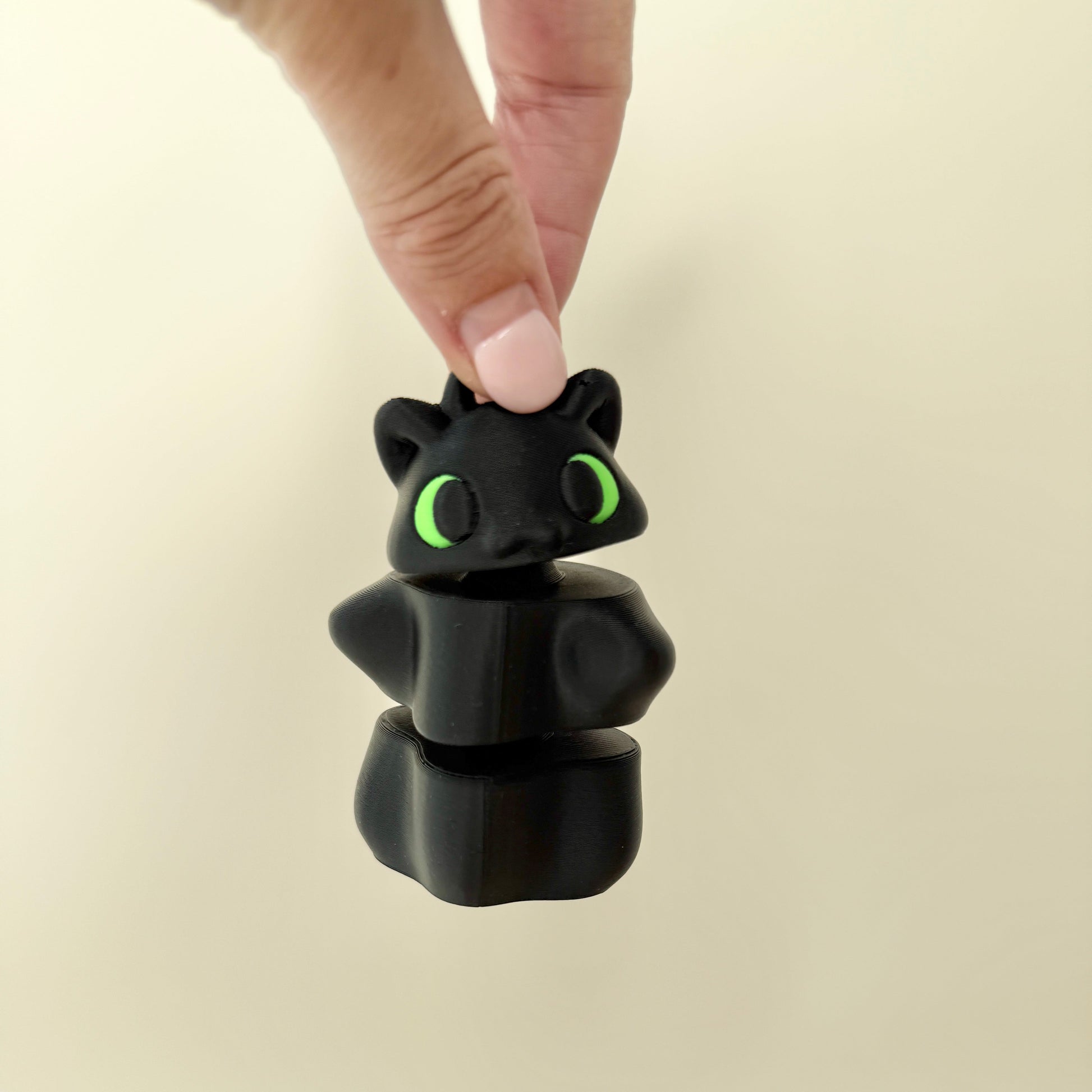 stacked handheld spinner with tactile ridges for grounding, repeatable motion, and regulation
