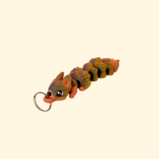 Chunky articulated squirrel add-on with full-body texture and colour-change finish for tactile fidgeting on lanyards.
