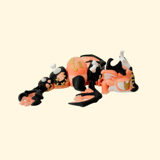 Articulated Halloween dragon with orange gradient, black and gold details, and raised stitch textures.
