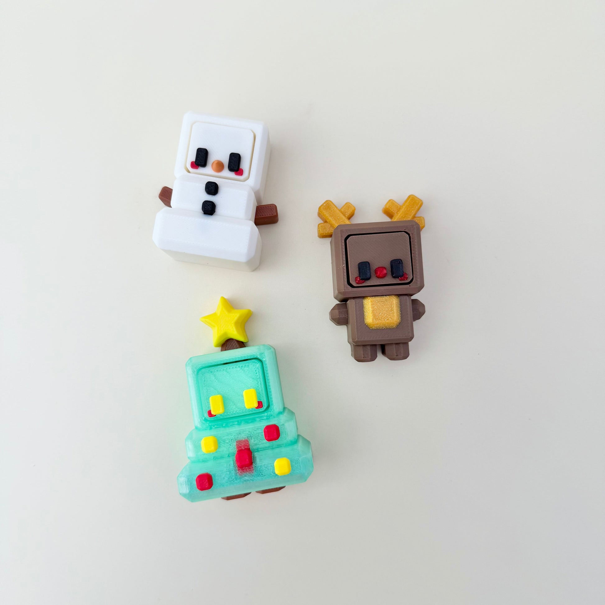 Compact Christmas clicker with tactile front panel; great for on-the-go sensory regulation.
