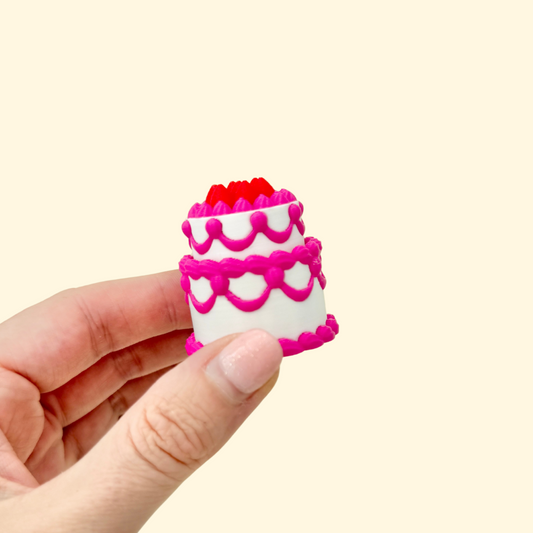 tiered cake themed stim toy designed for gifting and sensory play
