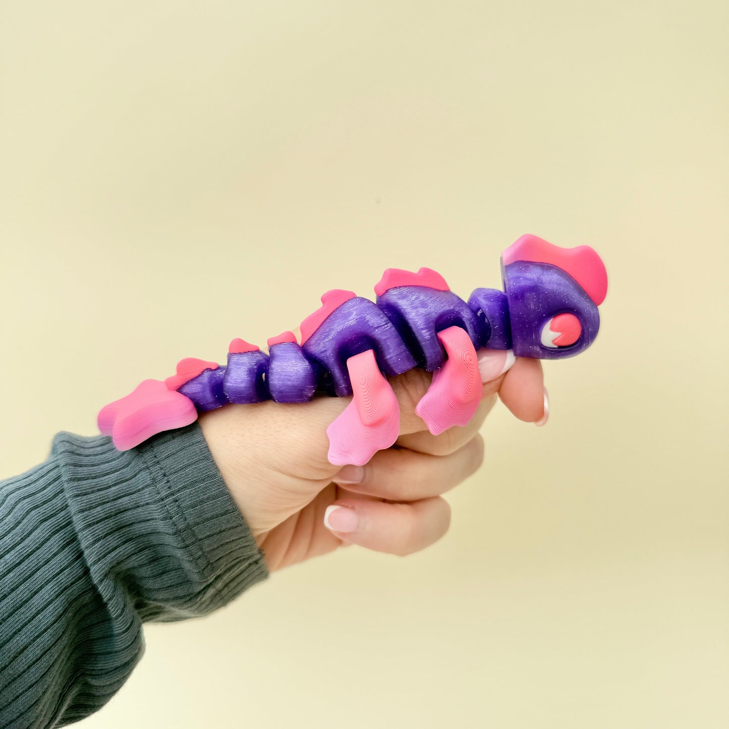 A flexible, textured toy made for sensory seekers, collectors, and calming hands.
