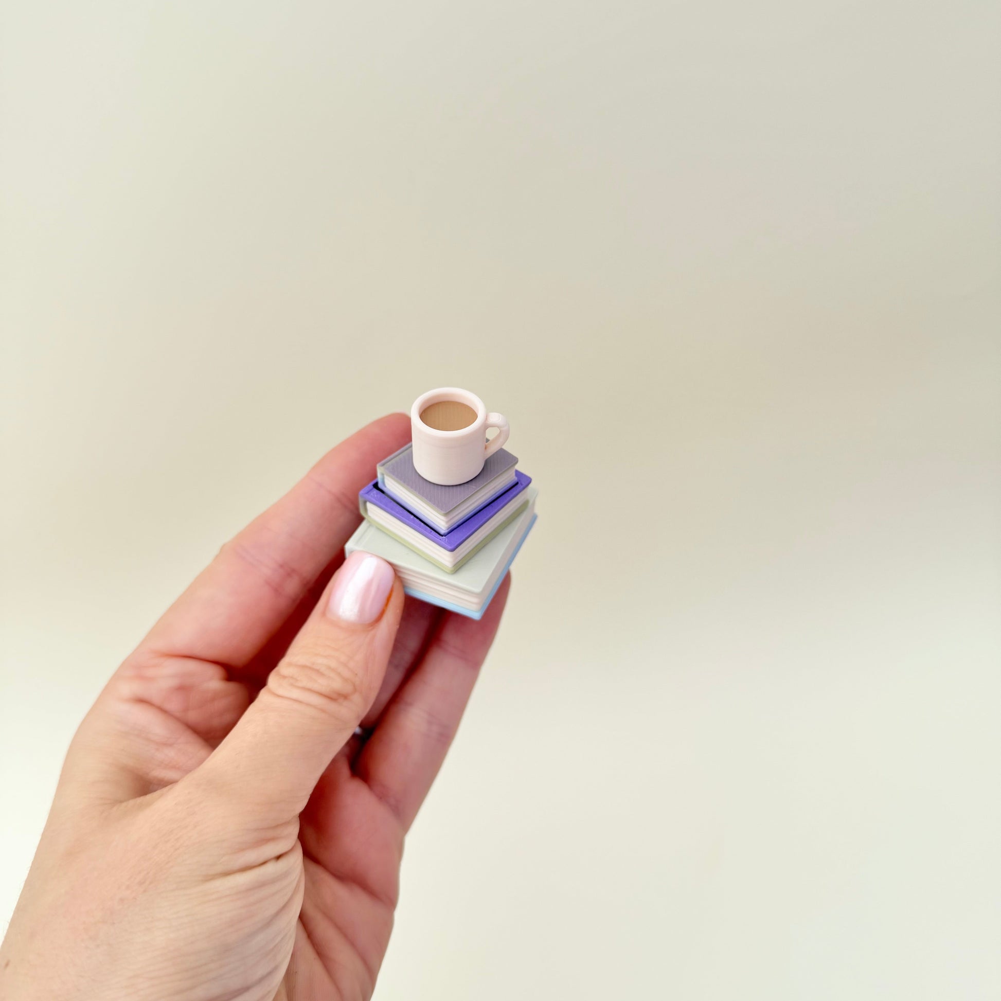 Mini books with a brew top; satisfying press-to-click action, quiet upgrade available, keyring hole for bags, keys, lanyards.
