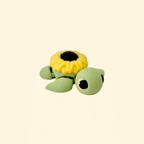 Articulated mini turtle fidget toy with sunflower design on back, perfect for sensory play and collection.