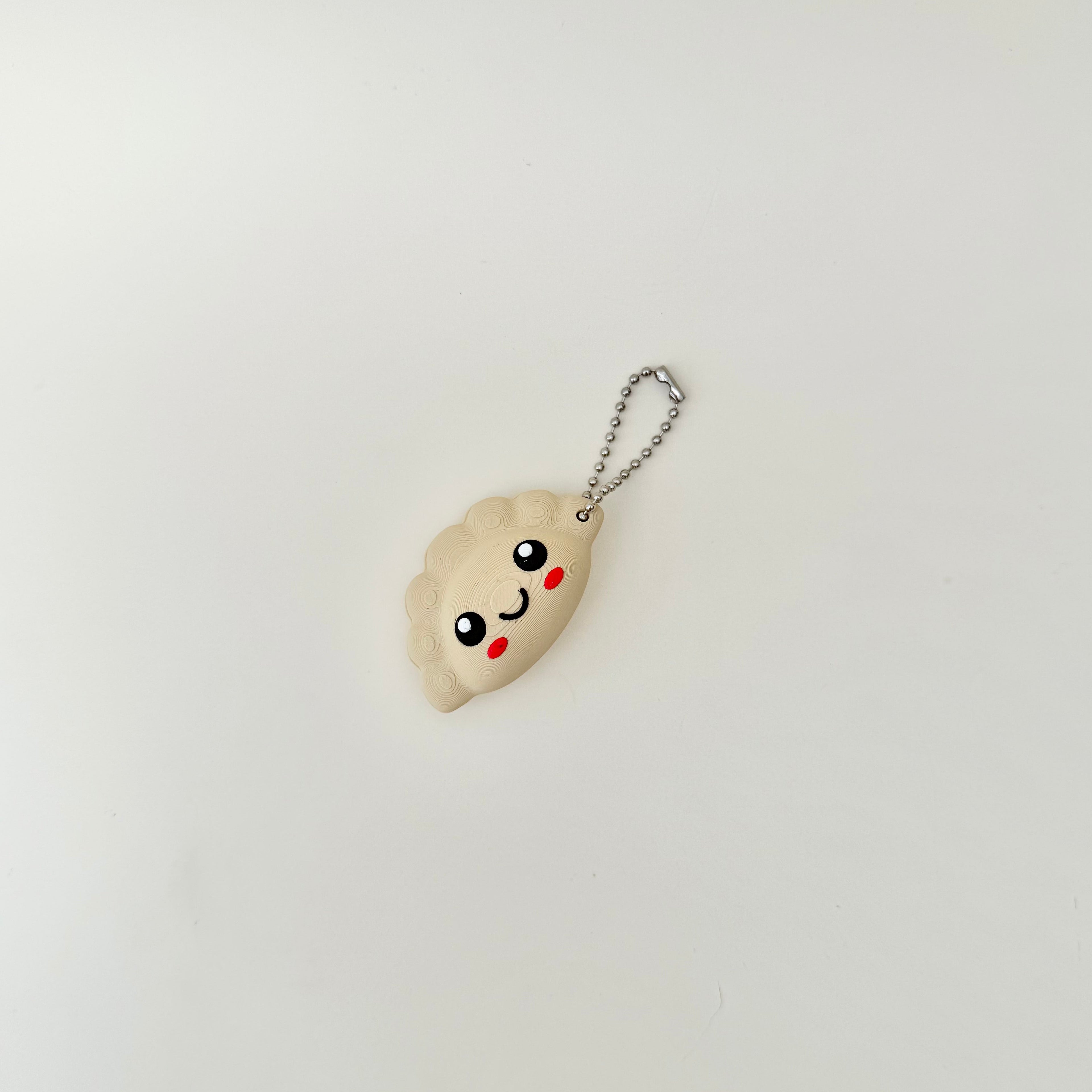 Pocket sized magnetic fidget that swings and returns with a soft clack designed for constant movement and travel use.
