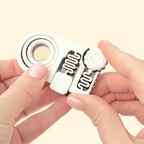 A 7cm multi-action fidget toy featuring a gyro spinner, clicking cog wheel, and silent button for tactile sensory play.