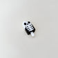 clicker fidget with raised bone details for thumb tracing and regulation
