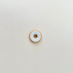 A smooth yet textured fidget toy with raised sprinkle details for added grip and a satisfying feel.