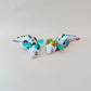 3D printed dragon with movable segments and wings, approx 16 cm, designed for satisfying hand movement.
