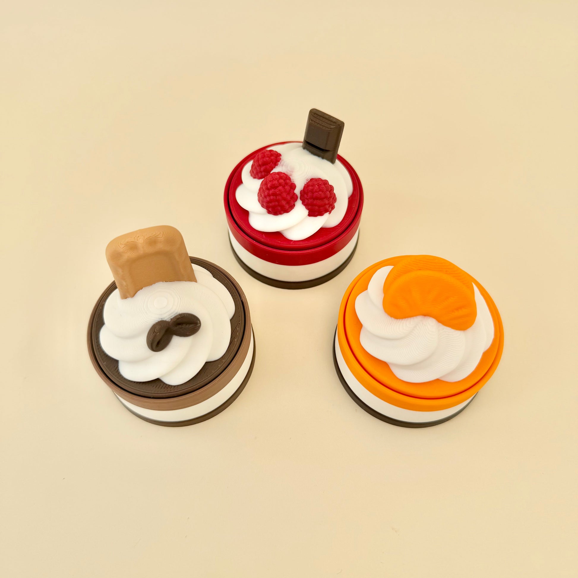 Small fidget clicker toy with textured topping details for tracing and sensory regulation, ideal for hands-on focus
