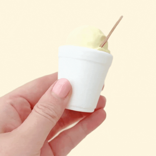 Handheld sensory tool with pressable feature for fidgeting and focus