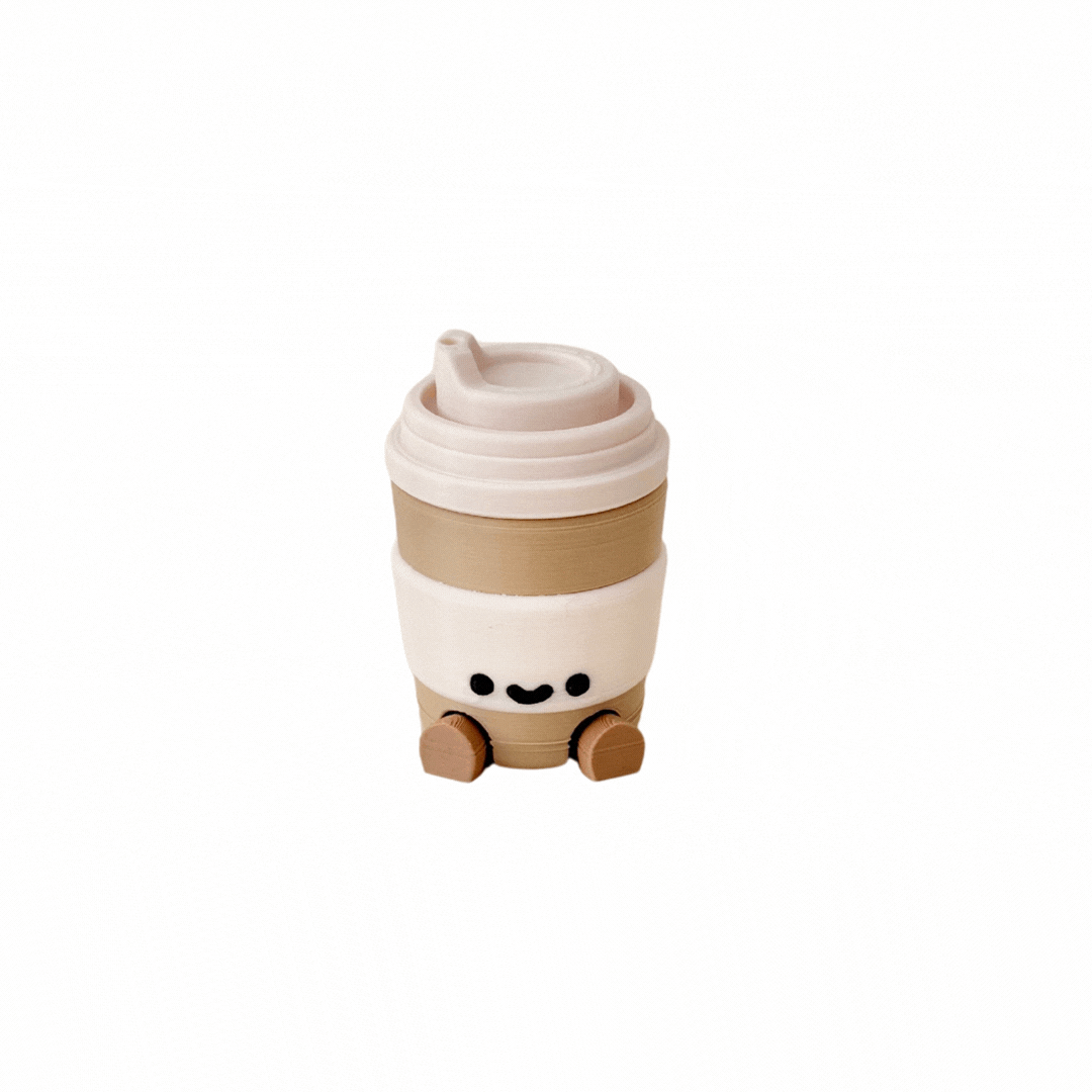 Mini takeaway cup character with dangling legs for desk, shelf and bedside decor in neuro-friendly spaces
