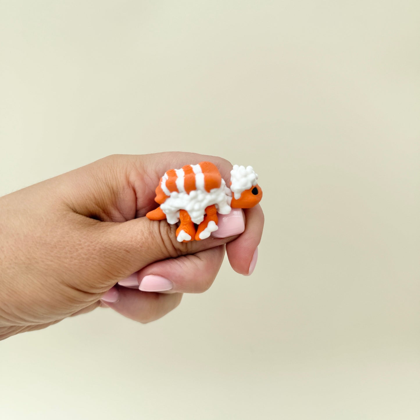 Sushi turtle with octopus-style topping, bumpy texture, and articulated motion for calm focus.
