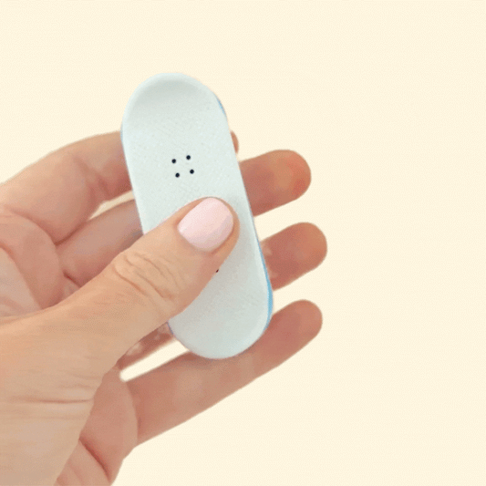 Detailed view highlighting the white textured grip surface for precise finger control on the FlexiDecks magnets.