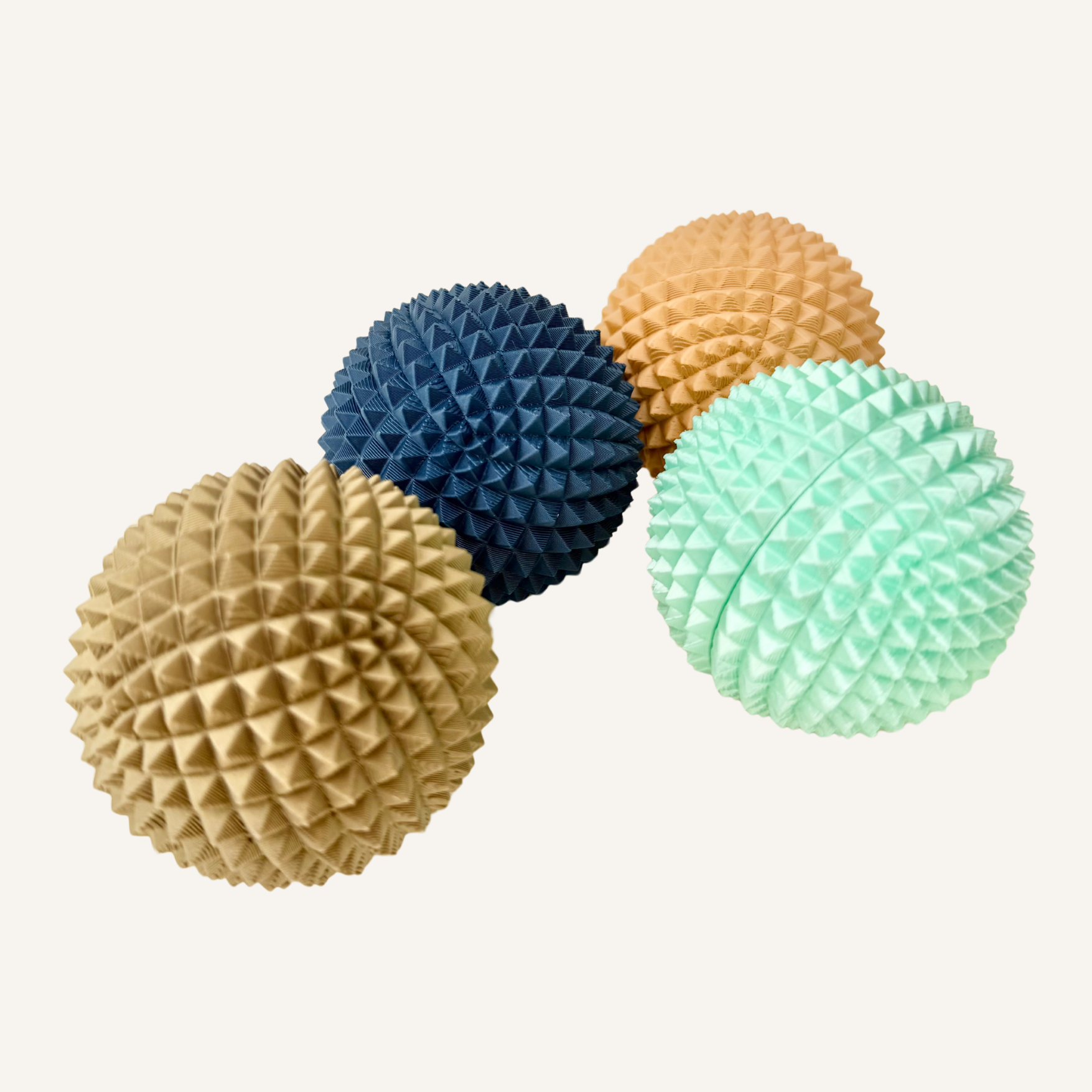 Firm spiked sensory ball designed for deep pressure input, silent use and controlled tactile feedback in the hand.

