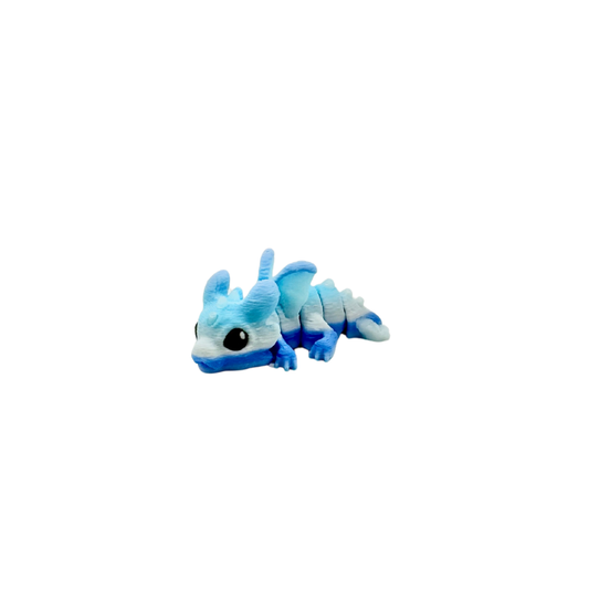 Mini fidget with mixed textures for grounding and tactile input
