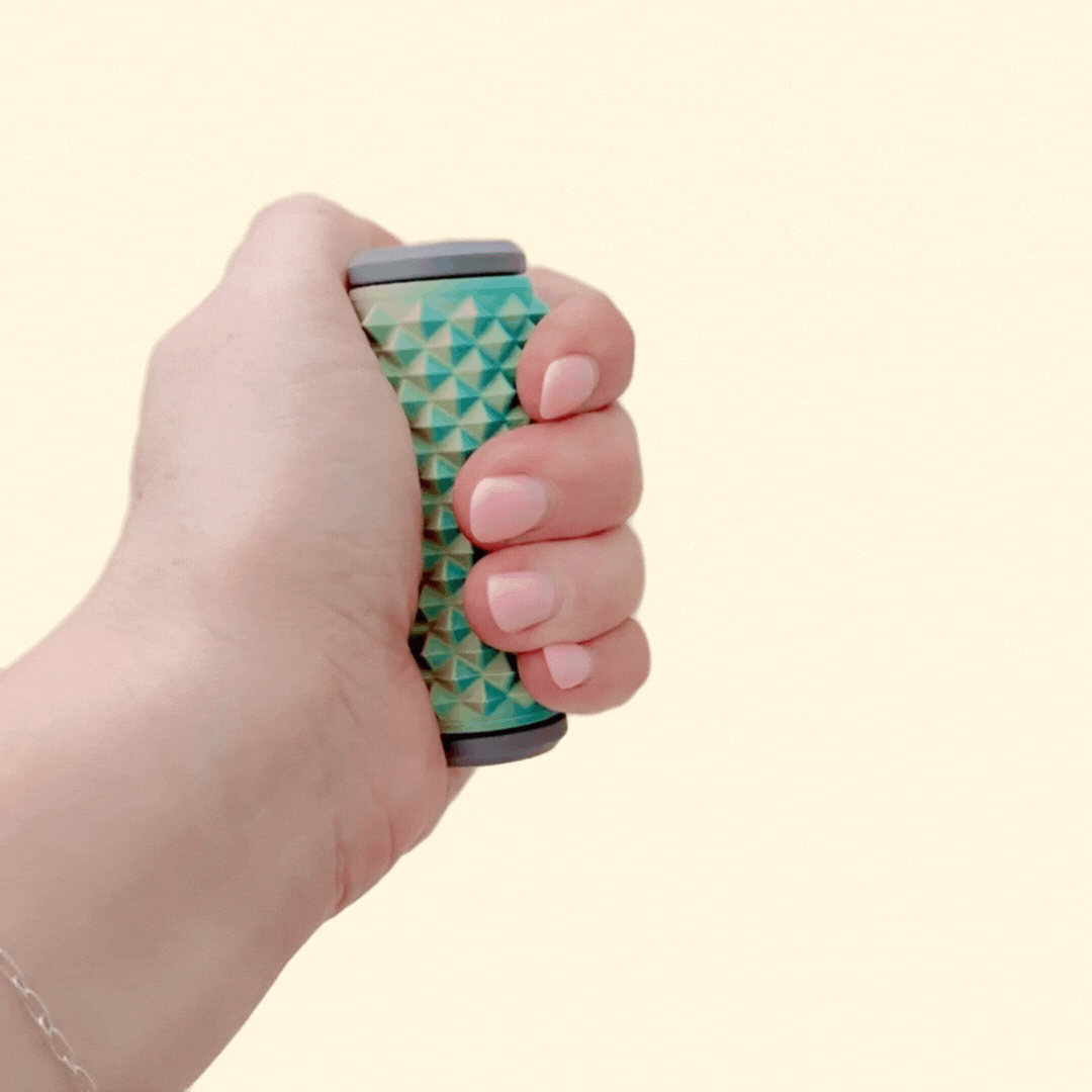 Rigid sensory roller with deep spike texture for pain stimming, tactile feedback and calming pressure.
