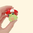 amphibian inspired clicker stim toy with flexible joints and sensory features
