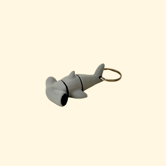 Hammerhead style fidget keyring add-on for neurodivergent support, smooth textures and quick access stimming.
