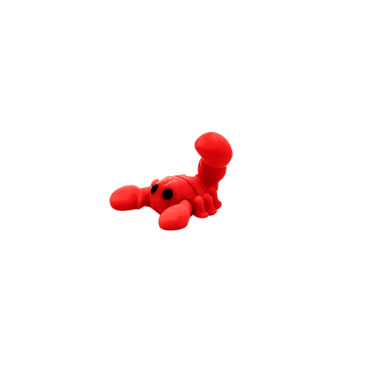 Pocket-size stim toy with quiet movement for buses, trains and queues
