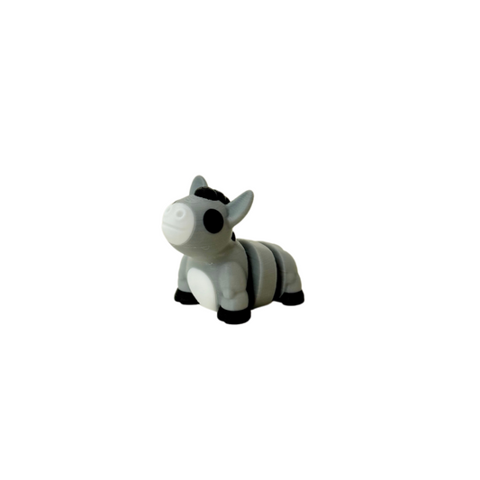 Compact sensory fidget with subtle movement for on-the-go use
