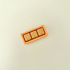 Three-button rectangular clicker toy providing tactile feedback for focus and relaxation
