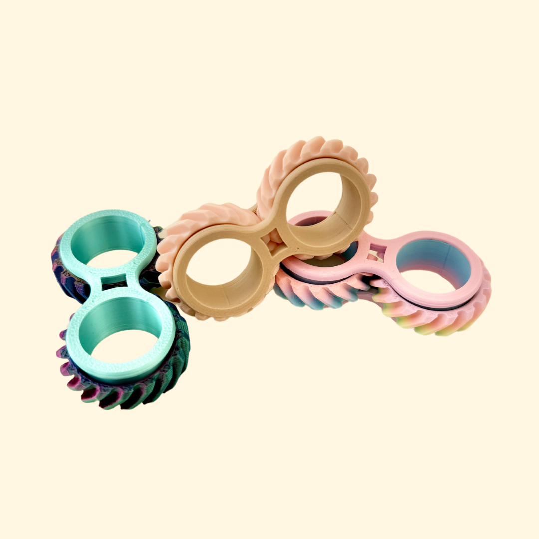 A compact and portable fidget toy with interlocking wheels designed for spinning and twisting, perfect for discreet fidgeting.