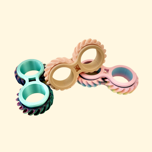 A compact and portable fidget toy with interlocking wheels designed for spinning and twisting, perfect for discreet fidgeting.