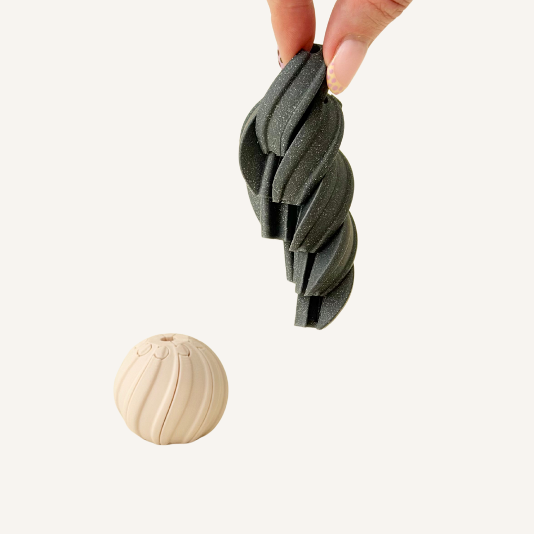 Small spiral twist sensory fidget with ridged texture and a satisfying rotating motion for tactile stimming.
