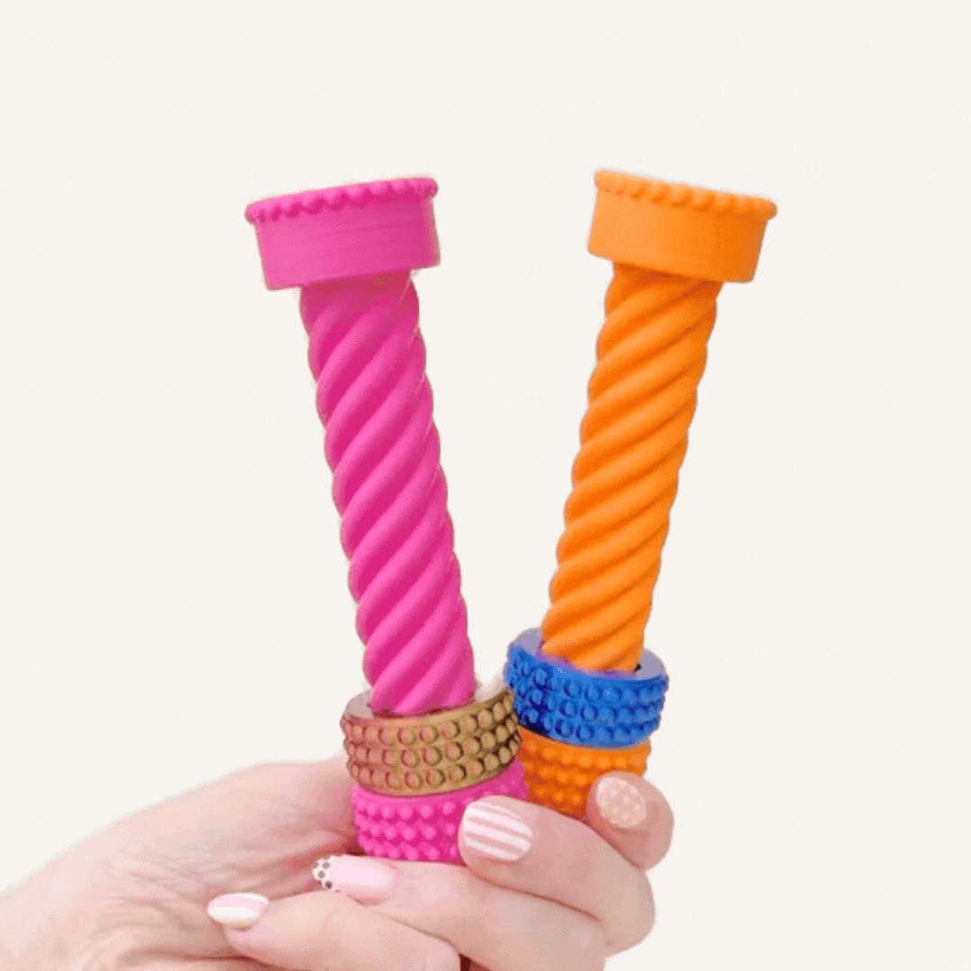 Long twist fidget with a moving textured ring that glides along the spiral for visual and tactile sensory input.
