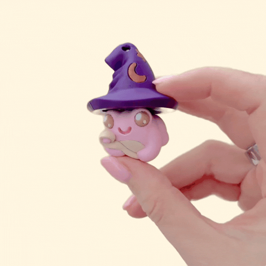 Potion-themed frog clicker fidget designed for focus, grounding and busy hands.
