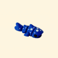 Dark blue whale shark fidget toy with light blue spots, black eyes, and a black mouth, fully articulated for sensory play.