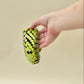 handheld net-style sensory fidget designed for smooth, repetitive motion
