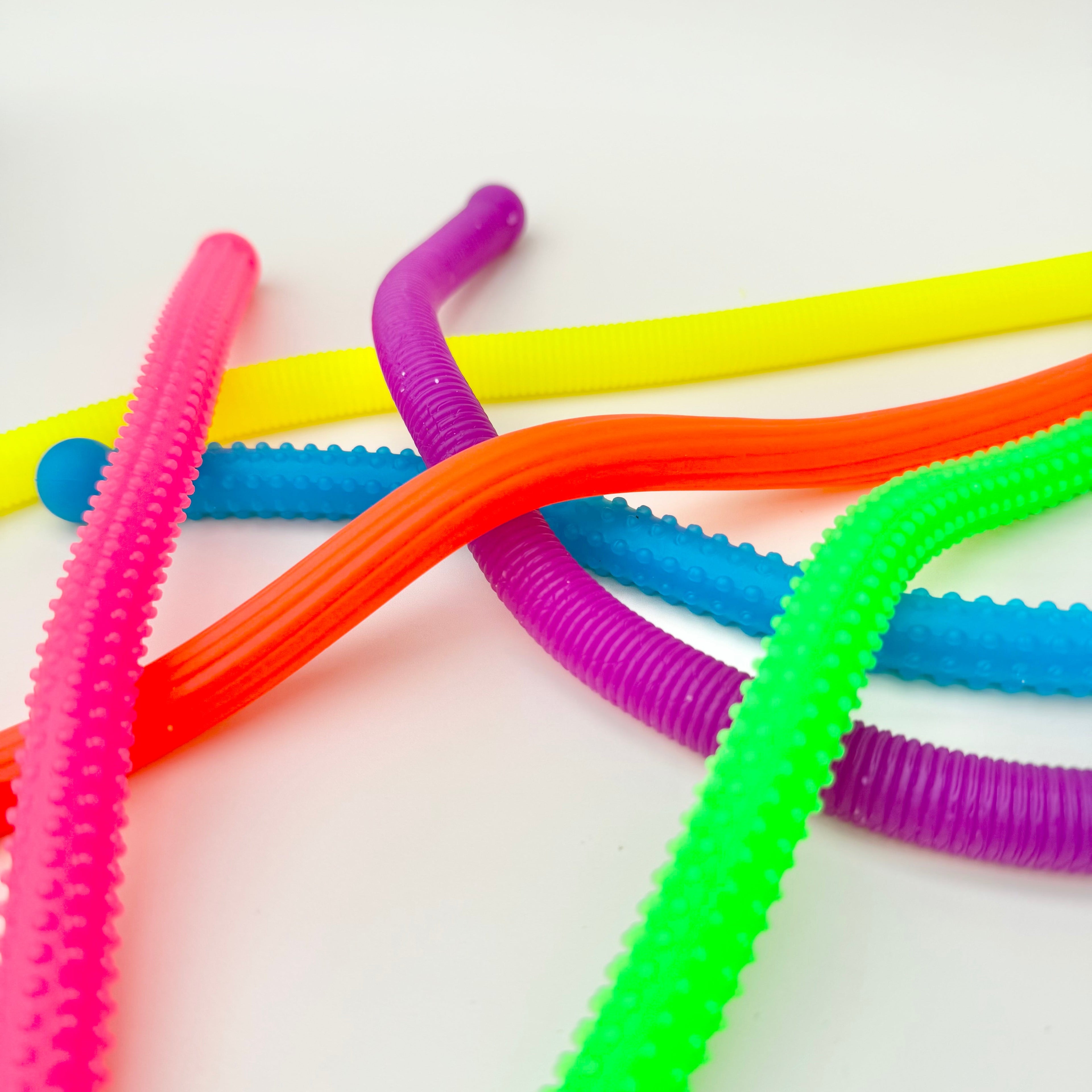 Stretchy sensory fidget noodles for finger fidgeting, tactile input and calming hand movement during focus breaks.
