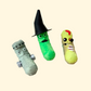 Halloween pickle fidget toy with witch hat and moustache, bumpy texture, mouth opens when wiggled, keyring-ready
