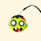 large zombie-themed clicker fidget with two pressable eyes and wrist strap attachment
