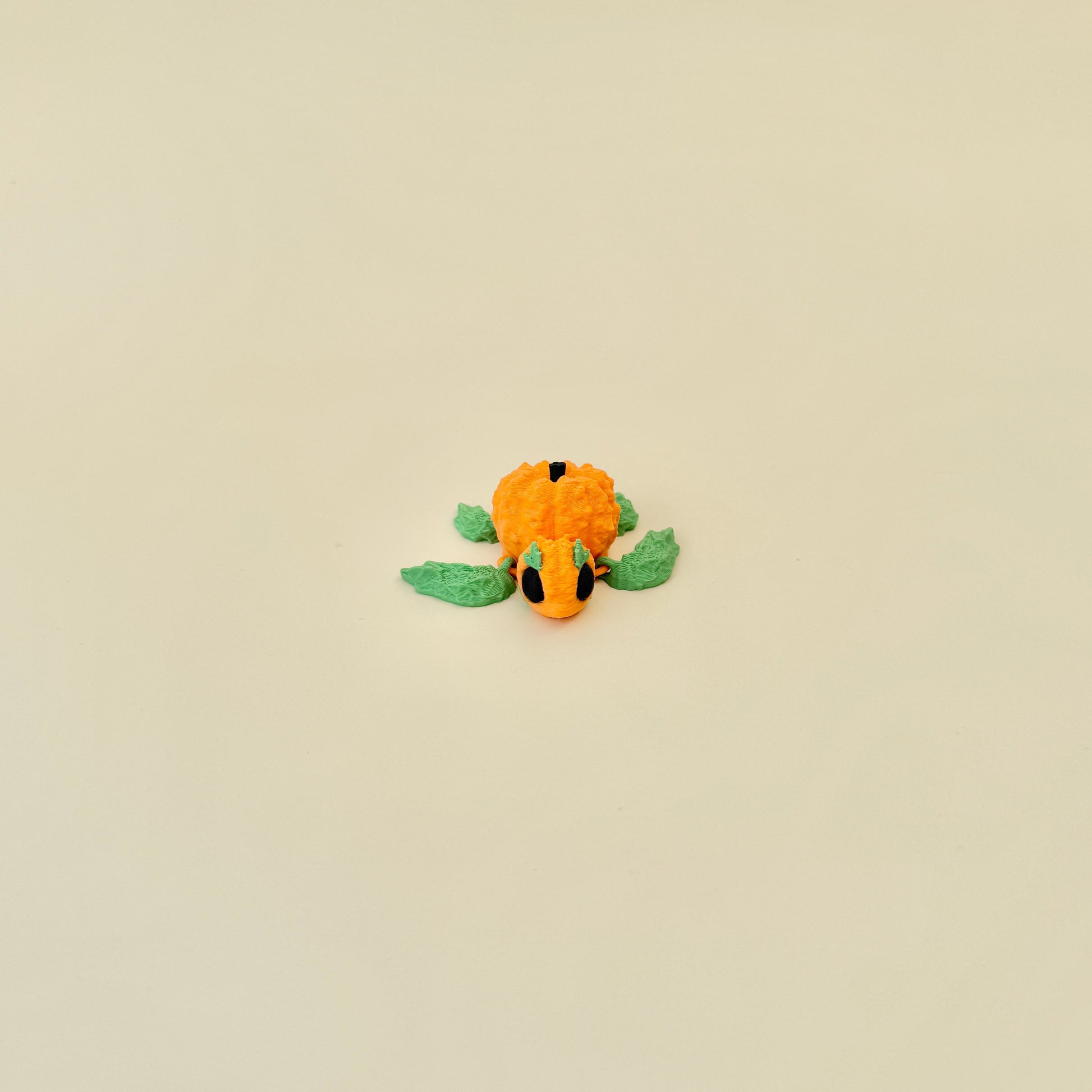 small articulated turtle with raised ridges designed for calming tactile play
