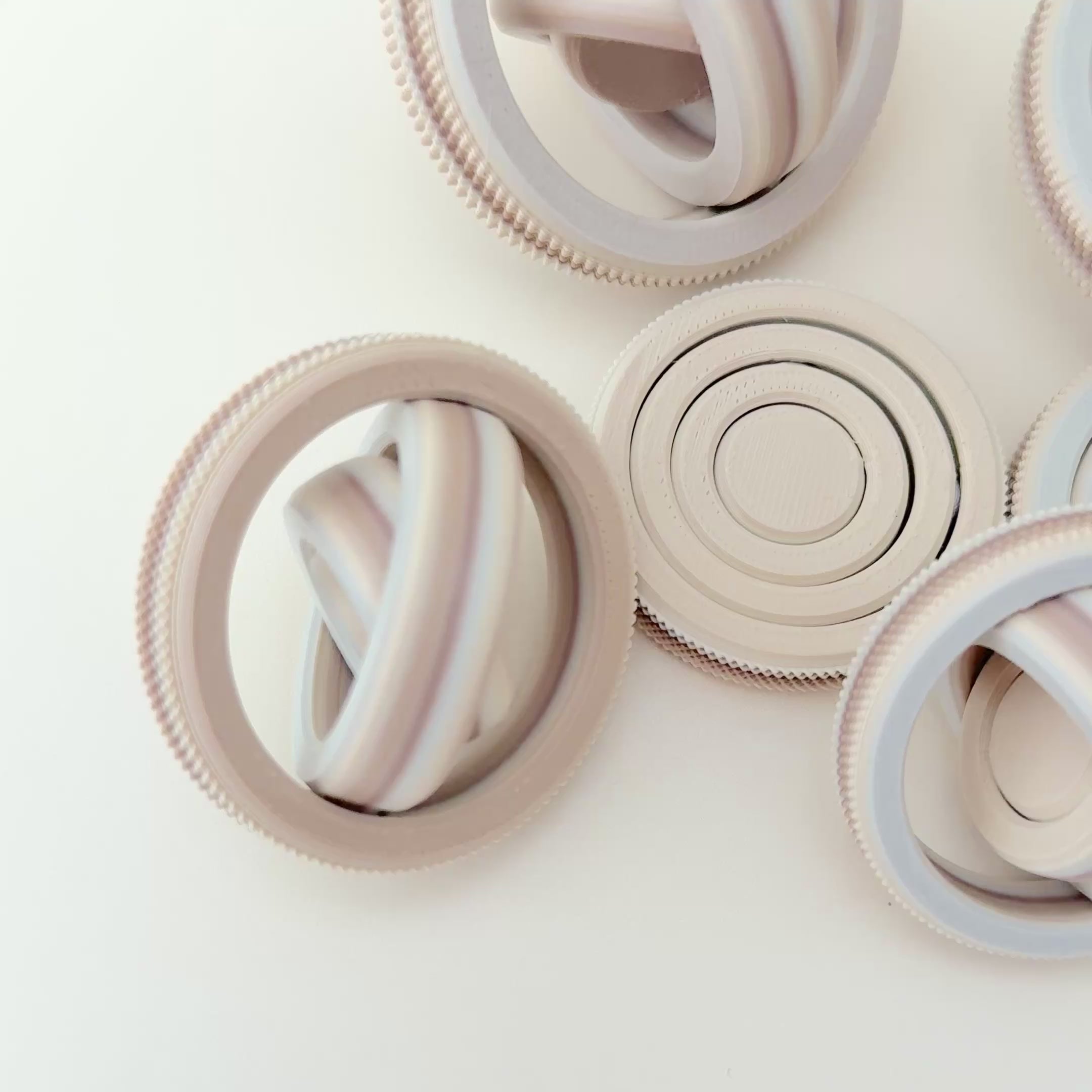 The RidgeSpin spinner in action, showing its multi-directional spinning rings.