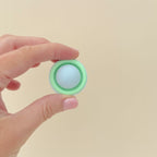 Engaging fidget for tactile stimulation and satisfying feedback.