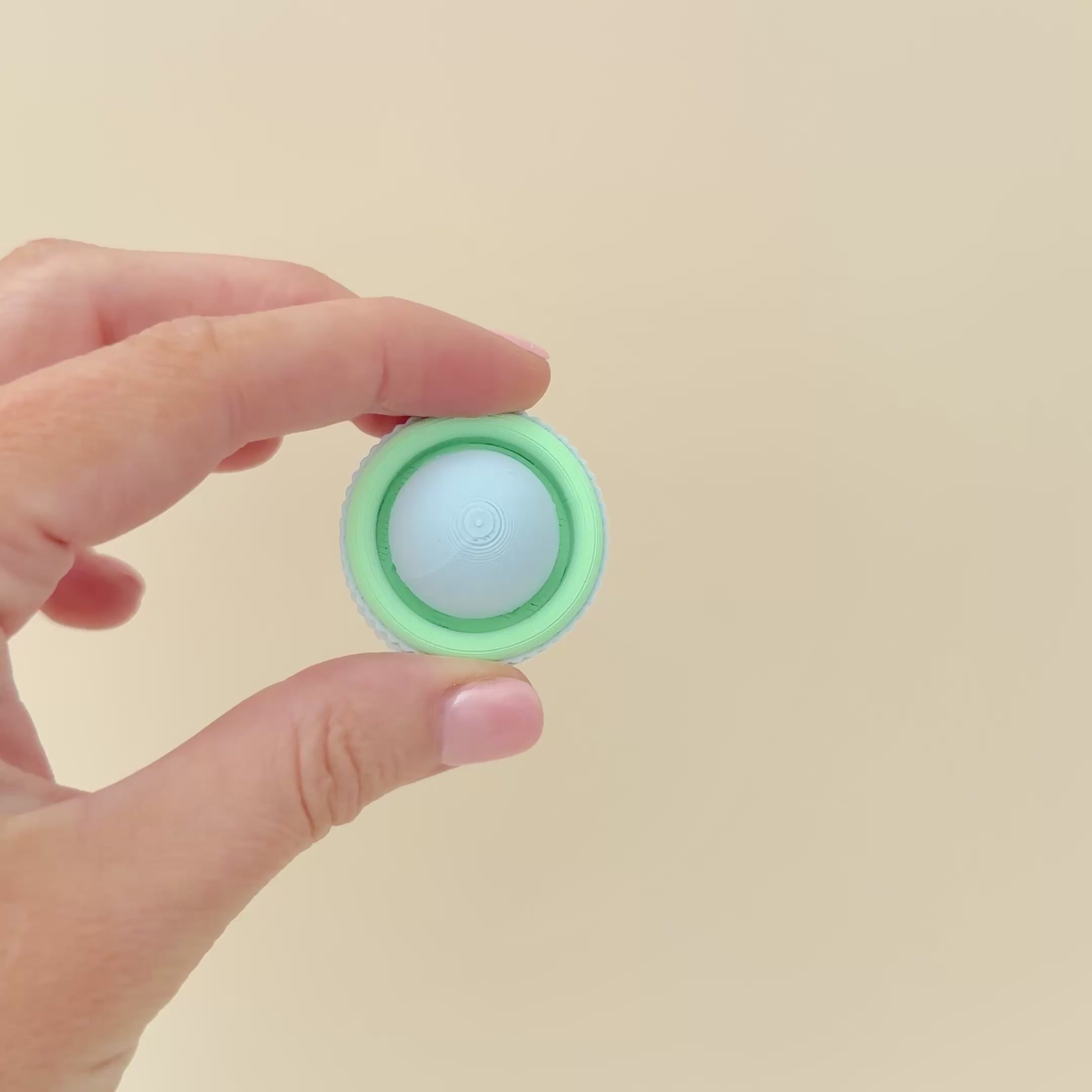Engaging fidget for tactile stimulation and satisfying feedback.