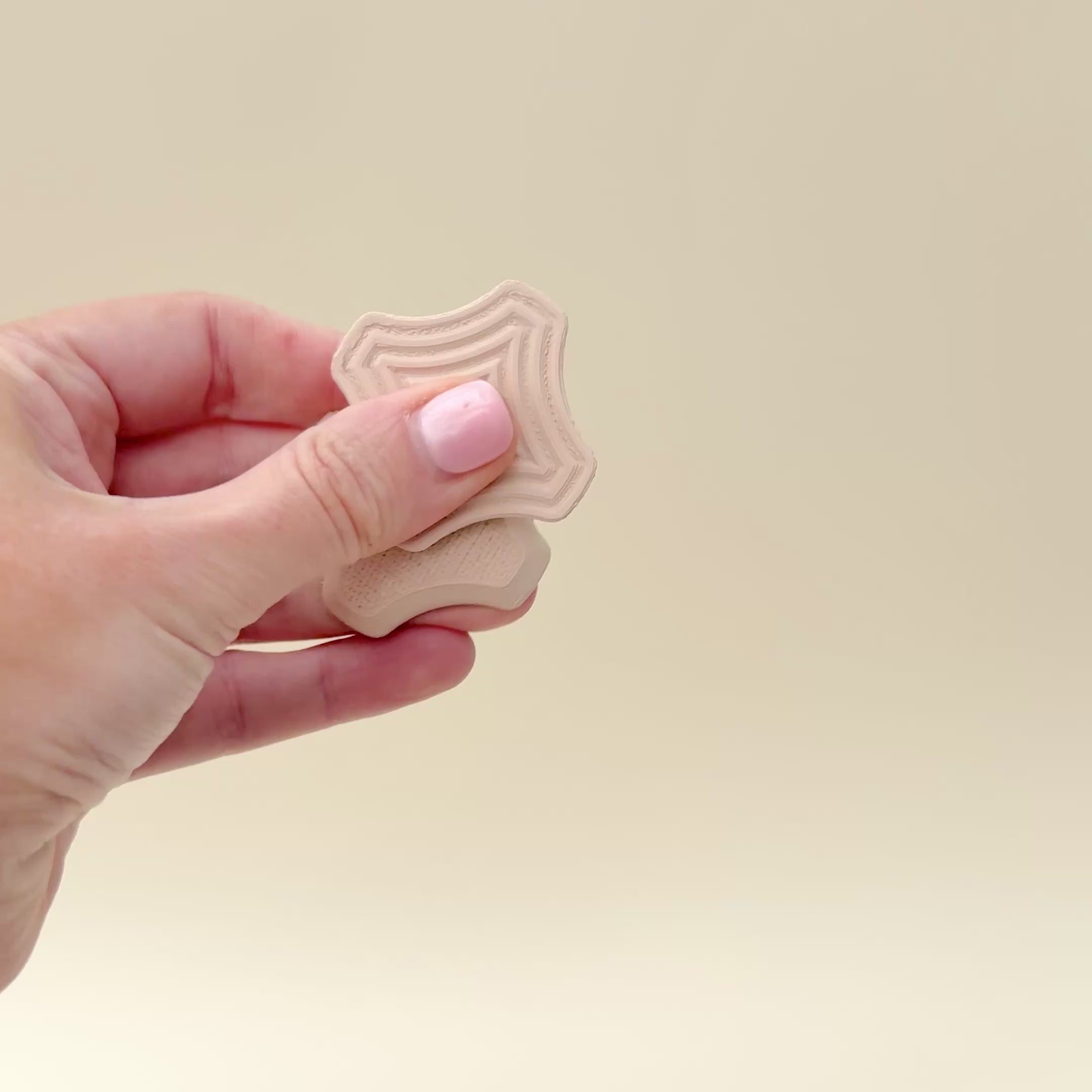 A beige matte version of the SnapSquares, perfect for subtle and professional fidgeting.