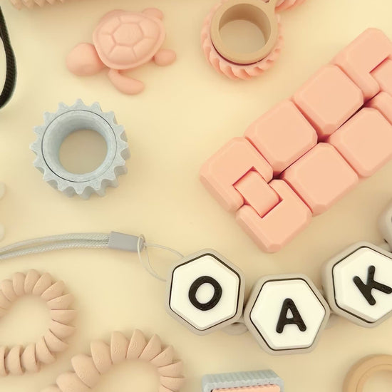 A diverse, robust set of tactile and quiet sensory toys designed to cater to various sensory preferences and needs.