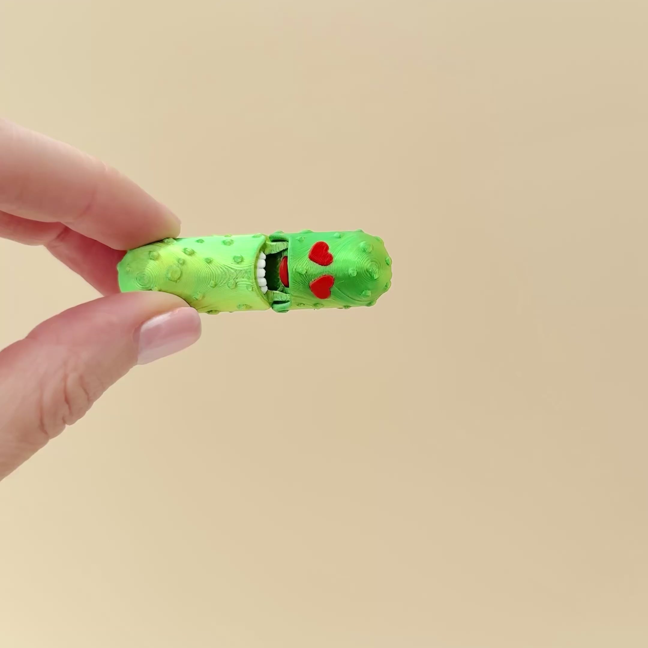 A Valentine-themed fidget toy with realistic pickle details and a playful interactive design.