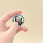 Petite fidget spinner featuring a full gyro spinning mechanism and colourful rainbow design.  Gyro Rainbow Fidget Spinner