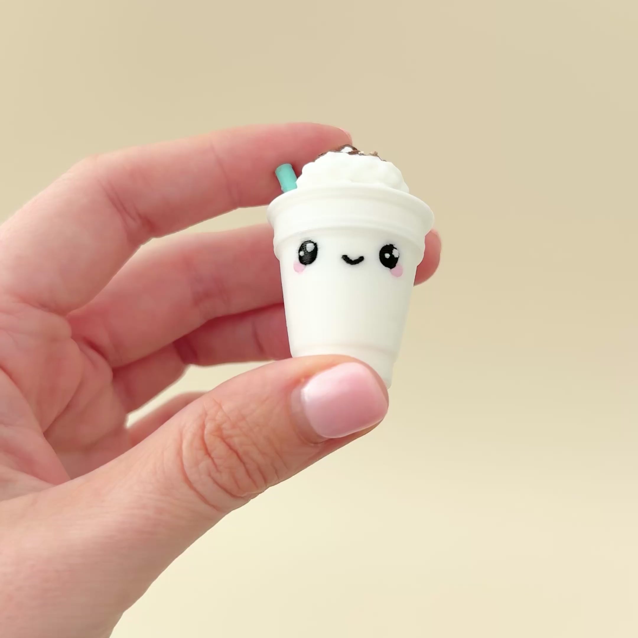 A textured fidget toy designed to look like a café-style frappe, perfect for coffee lovers.